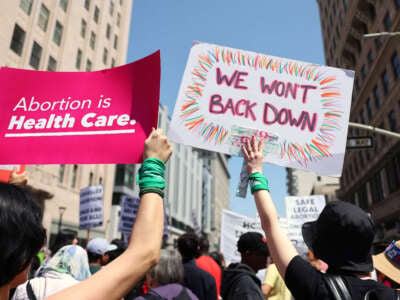 Protestors demonstrate at the March for Reproductive Rights organized by Women’s March L.A. on April 15, 2023, in Los Angeles, California.