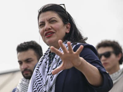 Rep. Rashida Tlaib speaks at a press conference with the student representatives of George Washington University after their solidarity encampment with Palestine was raided by the police, in front of the Congress building in Washington D.C., on May 8, 2024.