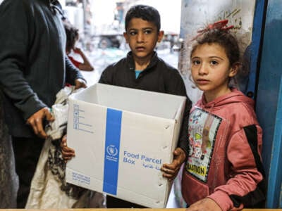 World Food Program (WFP) distributes food aid after a five-month gap in Gaza City, Gaza, on April 17, 2024.