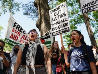 Pro-Palestinian students chant during a protest at Emory University on April 25, 2024, in Atlanta, Georgia.