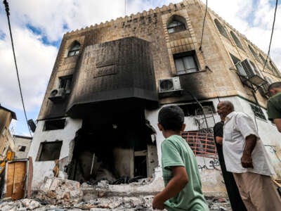 People inspect damage to a mosque building following an Israeli military operation in the Fara refugee camp near Tubas in the north of the occupied West Bank, Palestine, on August 29, 2024.