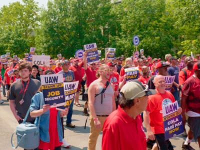 United Auto Worker members and supporters march at Cornell University to build awareness and attention to the issue, two days before going on strike.