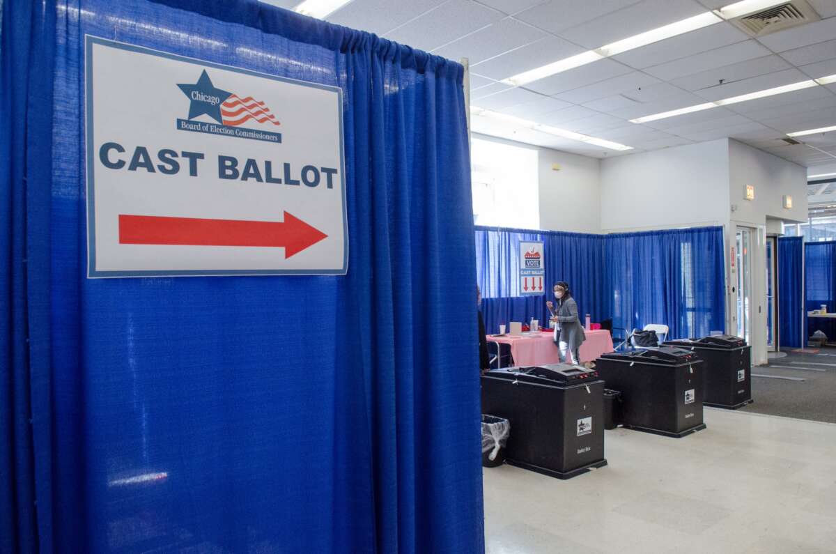 Voters cast their ballots at a polling station for the 2024 primary elections during early voting ahead of the election day in Chicago, Illinois, on March 13, 2024.