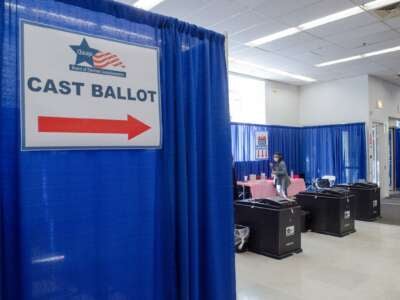 Voters cast their ballots at a polling station for the 2024 primary elections during early voting ahead of the election day in Chicago, Illinois, on March 13, 2024.