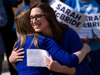 Democratic congressional candidate from Delaware Sarah McBride hugs Delaware State Treasurer Colleen Davis during a press conference on the steps of Delaware Legislative Hall on March, 4 2024, in Dover, Delaware.