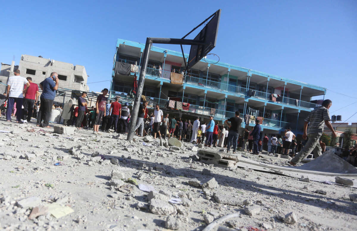 Civil defense teams and civilians carry out search and rescue operations from the rubbles after an Israeli attack at the school of United Nations Relief and Works Agency for Palestine Refugees in the Near East (UNRWA) at Nuseirat Refugee Camp in Gaza City, Gaza, on September 11, 2024.