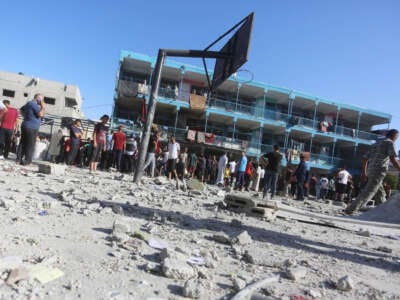 Civil defense teams and civilians carry out search and rescue operations from the rubbles after an Israeli attack at the school of United Nations Relief and Works Agency for Palestine Refugees in the Near East (UNRWA) at Nuseirat Refugee Camp in Gaza City, Gaza, on September 11, 2024.