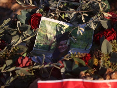 Citizens place stones, olive branches and a picture of the Turkish-American activist Aysenur Ezgi Eygi, killed by Israeli forces, at the place where she was shot in Beita town of Nablus, West Bank, on September 8, 2024.