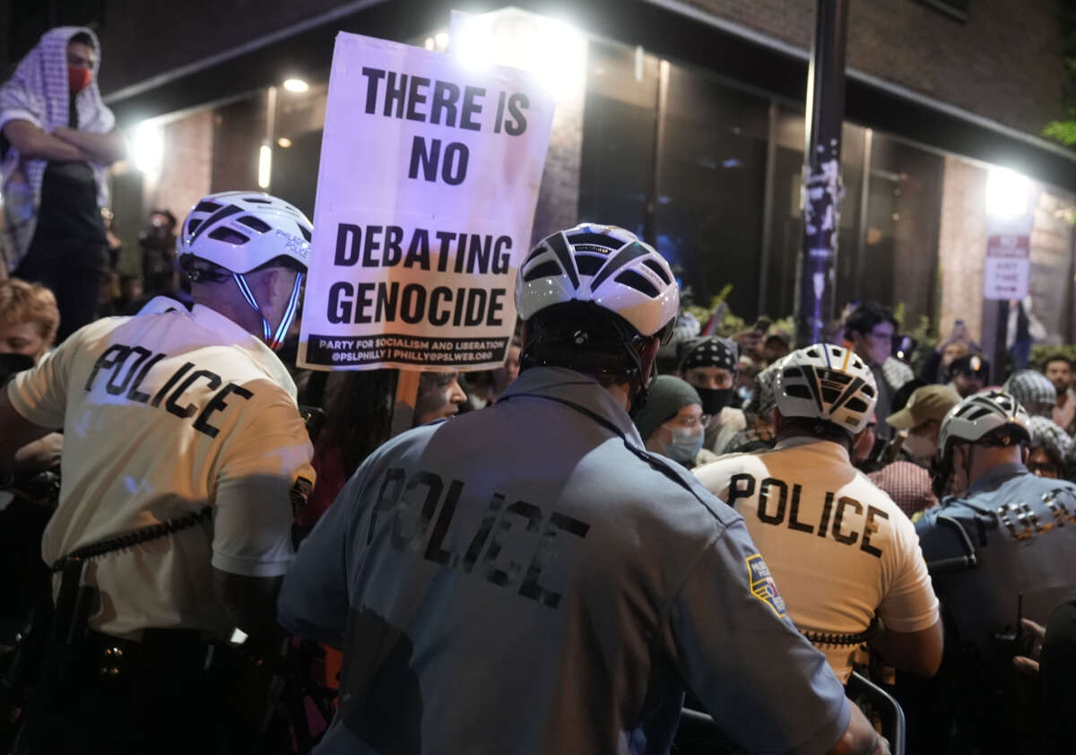 Philadelphia Police disperse a Palestinian solidarity demonstration while officers arrest some demonstrators as Vice President Kamala Harris and former President Donald Trump square off in their first debate on September 10, 2024, in Philadelphia.