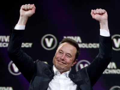 Elon Musk gestures as he attends the Viva Technology conference dedicated to innovation and startups at the Porte de Versailles exhibition centre on June 16, 2023, in Paris, France.