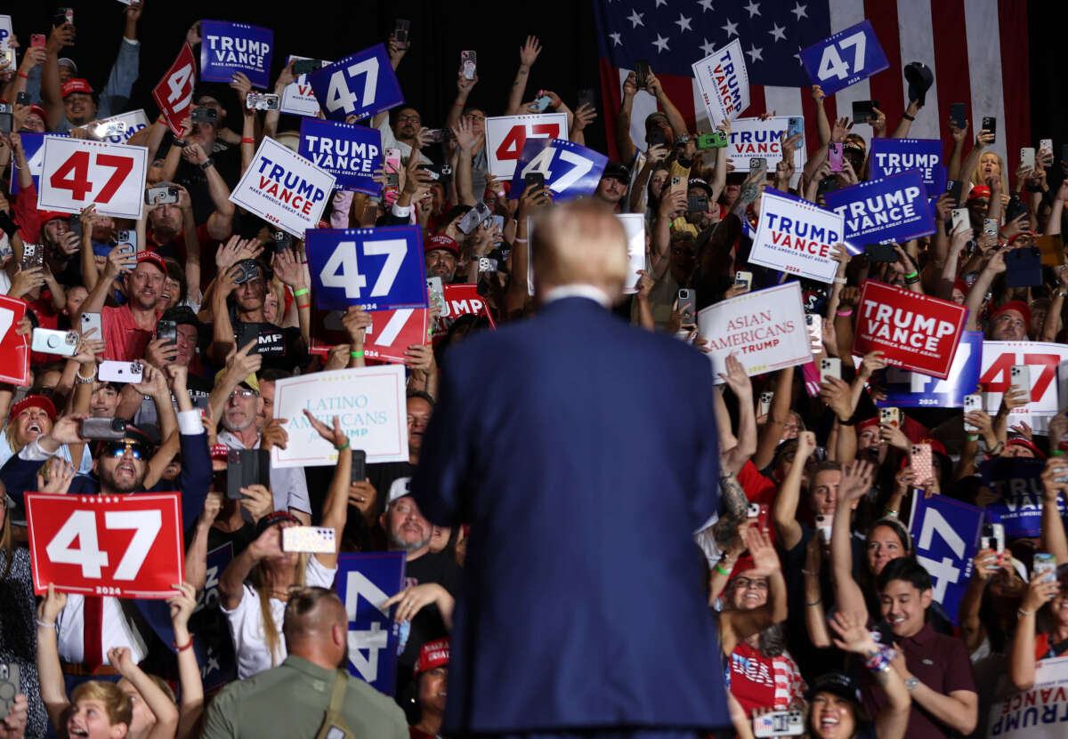 Former President Donald Trump greets supporters during a campaign rally at The Expo at World Market Center Las Vegas on September 13, 2024, in Las Vegas, Nevada.