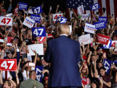 Former President Donald Trump greets supporters during a campaign rally at The Expo at World Market Center Las Vegas on September 13, 2024, in Las Vegas, Nevada.