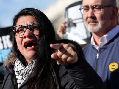 Rep. Rashida Tlaib speaks alongside Shawn Fain, President of the United Automobile Workers, at a press conference calling for a ceasefire in the Middle East outside of the U.S. Capitol on December 14, 2023, in Washington, D.C.