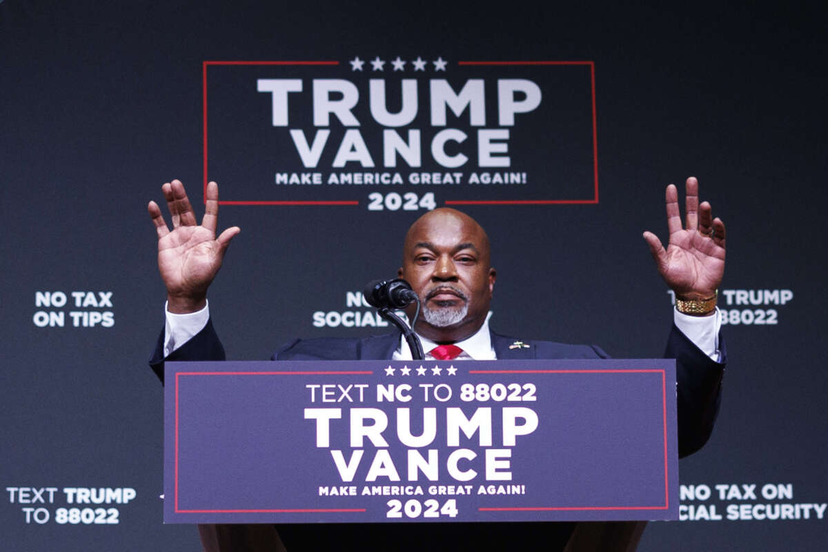 North Carolina Lt. Governor Mark Robinson walks on stage during a campaign event for Republican presidential nominee Donald Trump inside Harrah's Cherokee Center in Asheville, North Carolina, on August 14, 2024.