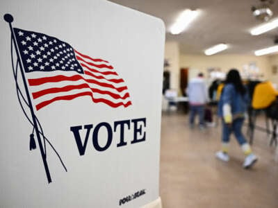 A voter casts a ballot during the Super Tuesday primary at a polling station in an American Legion Post in Hawthorne, California, on March 5, 2024.