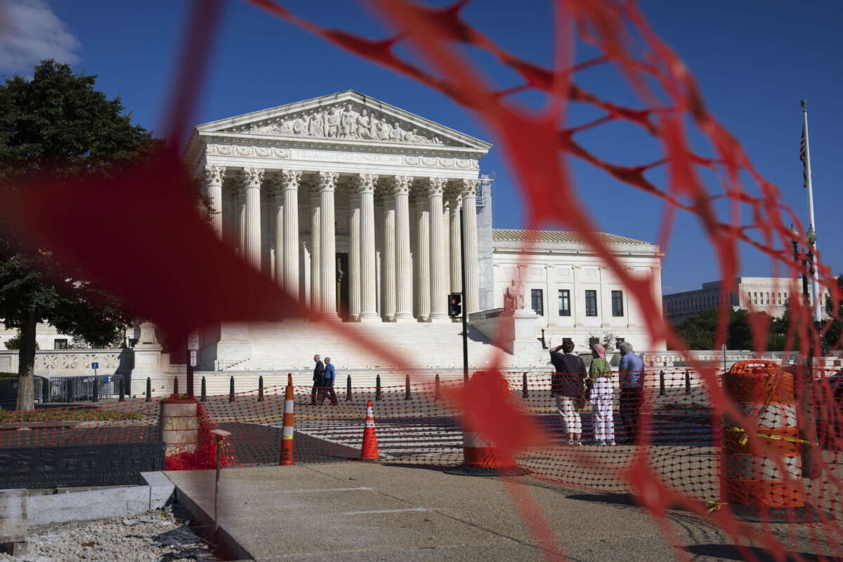 Visitors walk near the U.S. Supreme Court on September 10, 2024, in Washington, D.C.