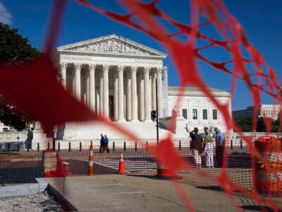 Visitors walk near the U.S. Supreme Court on September 10, 2024, in Washington, D.C.