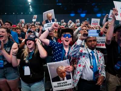 Supporters cheer as Republican presidential candidate and former President Donald Trump speaks at Turning Point USA Action's The People's Convention in Detroit, Michigan, on June 14, 2024.