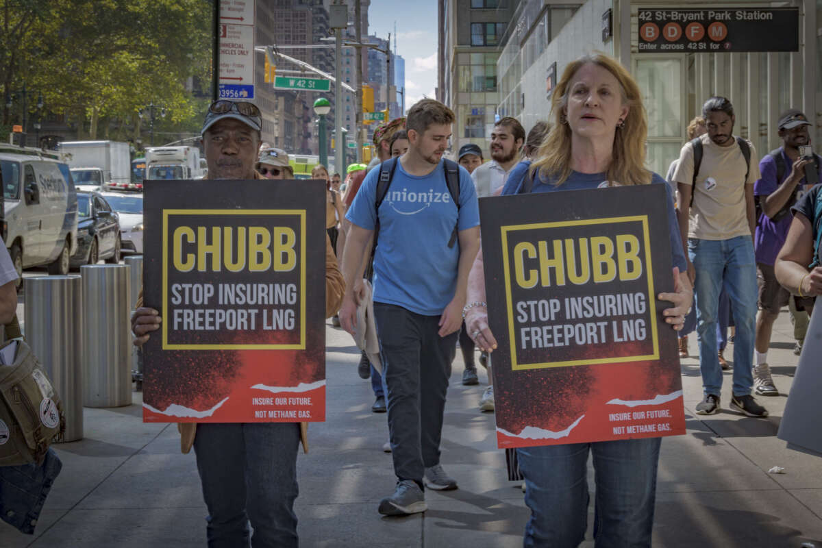 Better Brazoria’s Melanie Oldham and Manning Rollerson hand deliver a petition in September 2023 with tens of thousands of signatures to Chubb insurance offices in New York City demanding it stop insuring Freeport LNG.