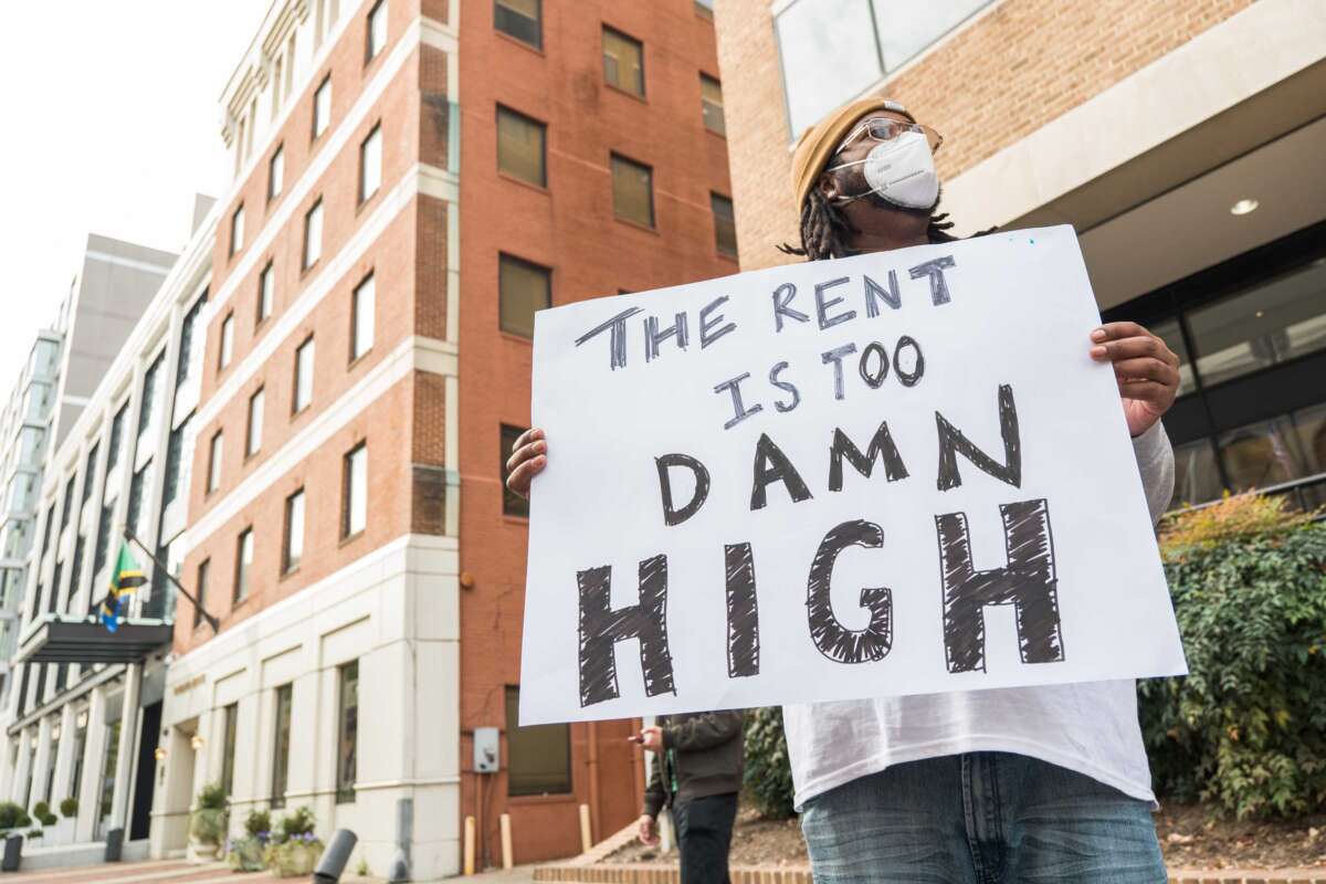 A member of the Tenant Unions Federation, a national "union of unions," gathers in Washington D.C. in May to demand better protections from abusive corporate landlords that benefit from federally backed financing.