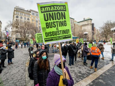 Members of the Workers Assembly Against Racism gathered across from Jeff Bezos-owned Whole Foods Market in Union Square South for a nation-wide solidarity event with the unionizing Amazon workers in Bessemer, Alabama, on February 20, 2021.