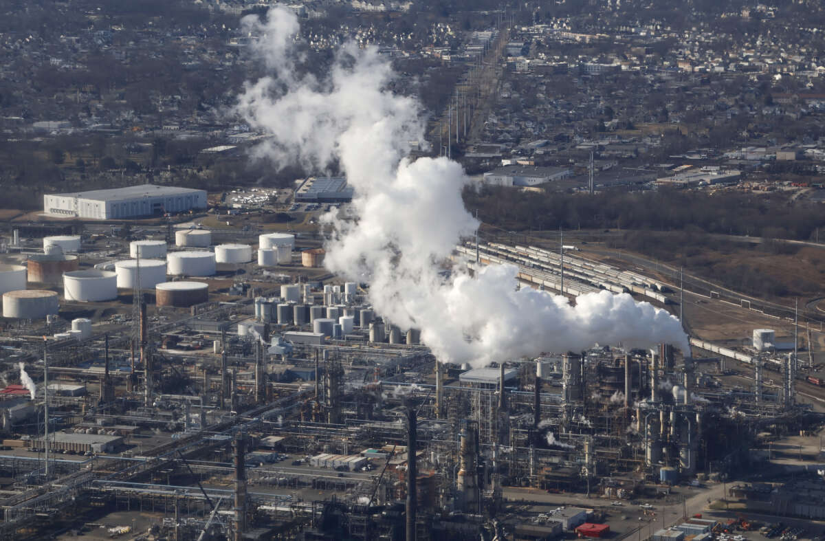 An emission comes out of a smoke stack at the Phillips 66 Refinery in Linden, New Jersey, on February 6, 2024.