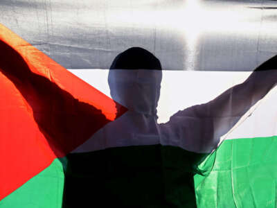 Pro-Palestine activists take part in the “Flood New York City for Gaza” protest during Labor Day on September 2, 2024, in New York City.