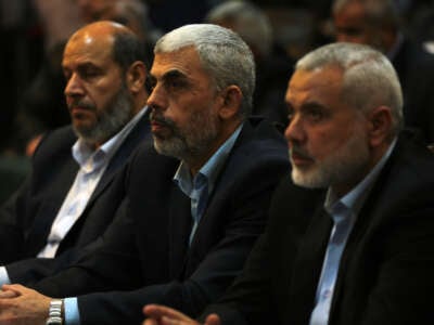 Yahya Sinwar and Ismail Haniyeh attend a gathering in Gaza City, Palestine, on May 1, 2017.