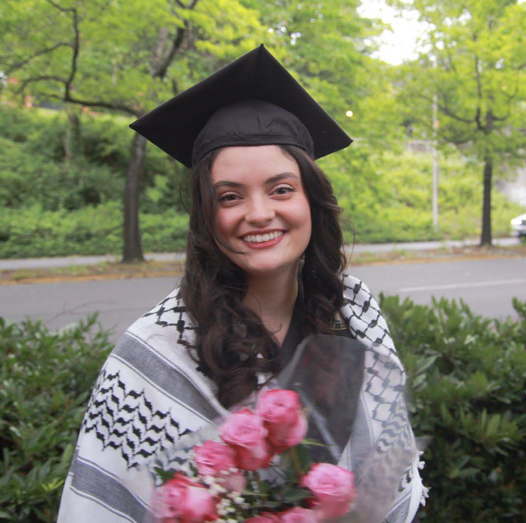 Ayşenur Eygi poses for a photo at her graduation from the University of Washington in the spring of 2024.