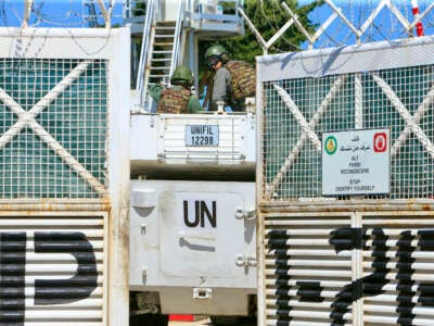 A UNIFIL (United Nations Interim Force in Lebanon) armored vehicle enters a UN base in the southern Lebanese village of Mansouri, near the border with Israel, on April 17, 2024.