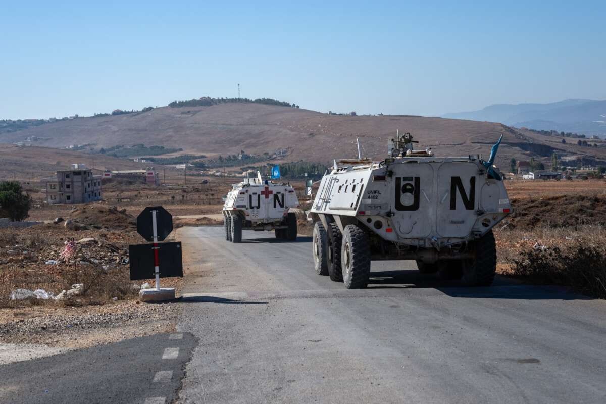 UNIFIL armoured personnel carriers depart a base to patrol near the Lebanon-Israel border on October 5, 2024 in Marjayoun, Lebanon.