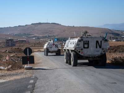 UNIFIL armoured personnel carriers depart a base to patrol near the Lebanon-Israel border on October 5, 2024 in Marjayoun, Lebanon.