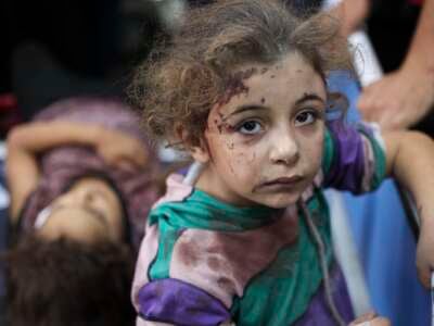 Children who were injured during an Israeli operation in the Jabalia refugee camp in the central Gaza Strip await treatment at Al-Ahli Arab hospital in Gaza City on October 21, 2024.