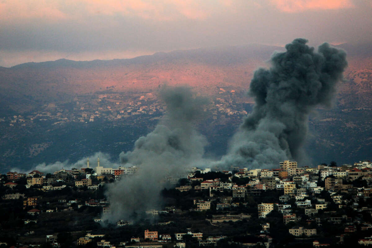 Heavy smoke from Israeli air raids billows from the southern Lebanese border town of Khiam on September 30, 2024.