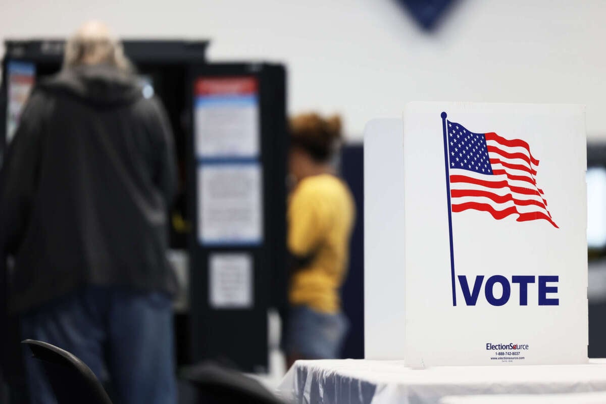 People vote during the midterm elections at Morningside Baptist Church Gym on November 8, 2022, in Atlanta, Georgia.