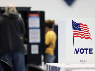 People vote during the midterm elections at Morningside Baptist Church Gym on November 8, 2022, in Atlanta, Georgia.