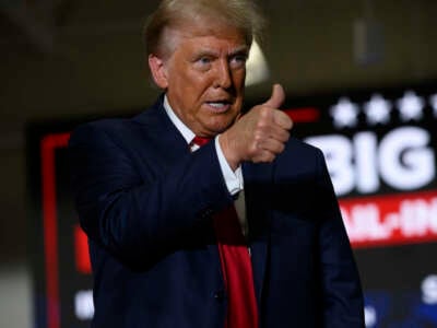 Former President Donald Trump gestures while speaking at a campaign rally at the Bayfront Convention Center on September 29, 2024, in Erie, Pennsylvania.