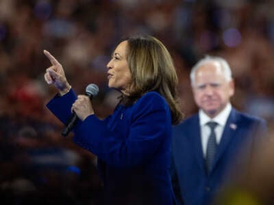 Democratic presidential candidate, Vice President Kamala Harris, and vice presidential candidate, Minnesota Gov. Tim Walz, address supporters at a campaign rally at the Fiserv Forum on August 20, 2024, in Milwaukee, Wisconsin.