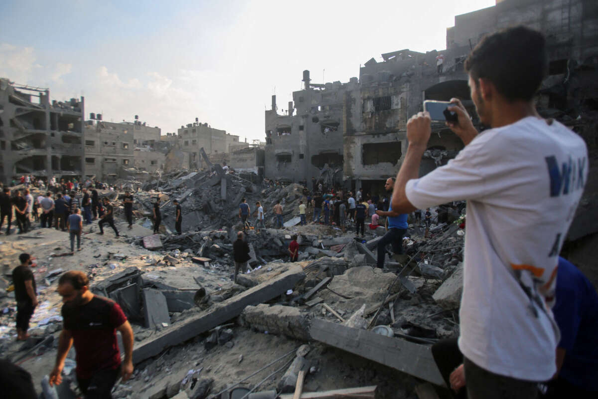 Palestinians check the destruction in the aftermath of an Israeli strike the previous night in the Jabalia camp for Palestinian refugees in the Gaza Strip, on November 1, 2023.