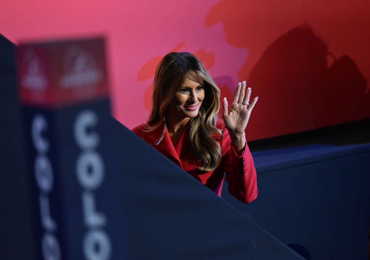 Former first lady Melania Trump waves to the crowd as she walks to the VIP box on the final night of the Republican National Convention at Fiserv Forum on July 18, 2024, in Milwaukee, Wisconsin.