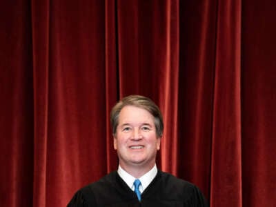 Associate Justice Brett Kavanaugh stands during a group photo of the Justices at the Supreme Court in Washington, D.C., on April 23, 2021.