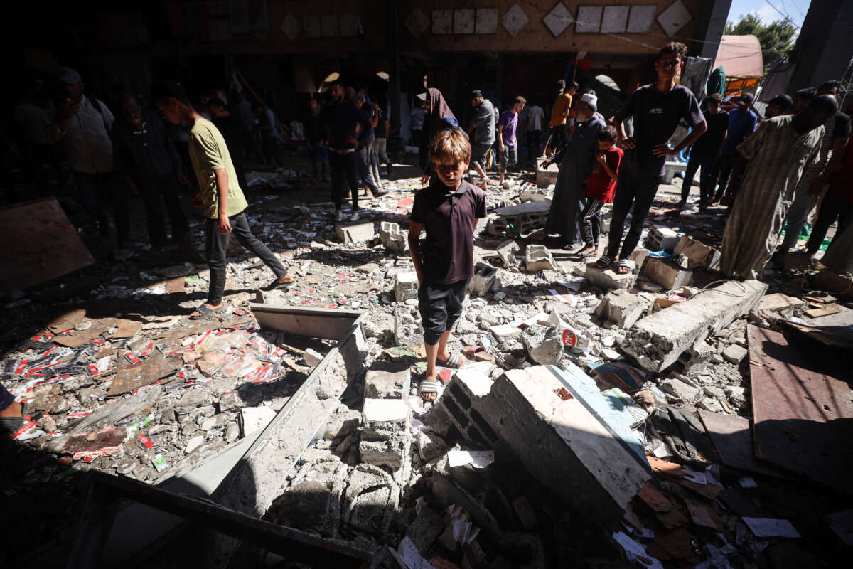 Palestinians inspect a school that the Israeli occupation army attacks in Deir al-Balah, Gaza, on October 10, 2024.