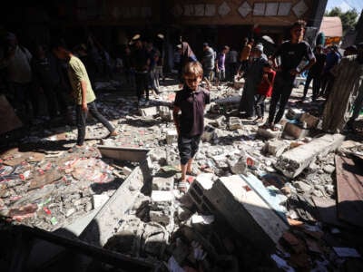 Palestinians inspect a school that the Israeli occupation army attacks in Deir al-Balah, Gaza, on October 10, 2024.