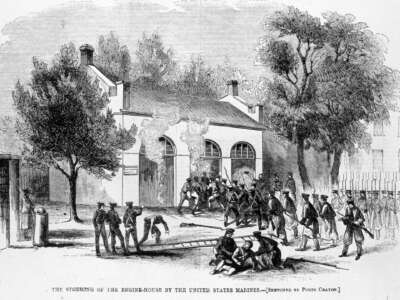 An illustration depicts American marines storming the engine house at Harpers Ferry, West Virginia, after it was captured by the abolitionist John Brown.