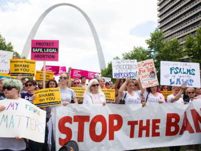 Thousands of demonstrators march in support of Planned Parenthood and pro-choice as they protest a state decision that would effectively halt abortions by revoking the license of the last center in the state that performs the procedure, during a rally in St. Louis, Missouri, on May 30, 2019.