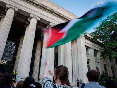 MIT students and faculty gather outside of the campus to protest the university's involvement with Israel and show support for Palestine on September 13, 2024, in Cambridge, Massachusetts.