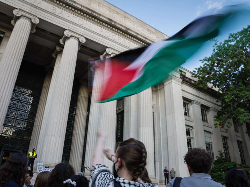 MIT students and faculty gather outside of the campus to protest the university's involvement with Israel and show support for Palestine on September 13, 2024, in Cambridge, Massachusetts.