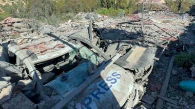 This picture shows a car marked "Press" at the site of an Israeli airstrike that targeted an area where a number of journalists were located in the southern Lebanese village of Hasbaya on October 25, 2024.