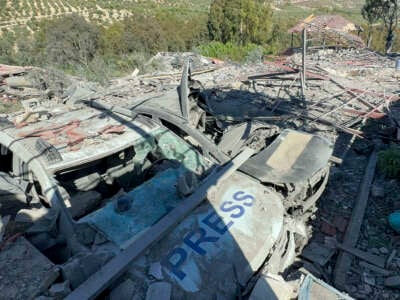 This picture shows a car marked "Press" at the site of an Israeli airstrike that targeted an area where a number of journalists were located in the southern Lebanese village of Hasbaya on October 25, 2024.