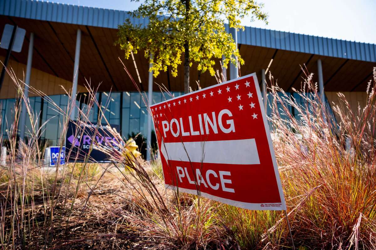 A polling place sign is displayed outside a polling location on the first day of Virginia's in-person early voting at Long Bridge Park Aquatics and Fitness Center on September 20, 2024, in Arlington, Virginia.